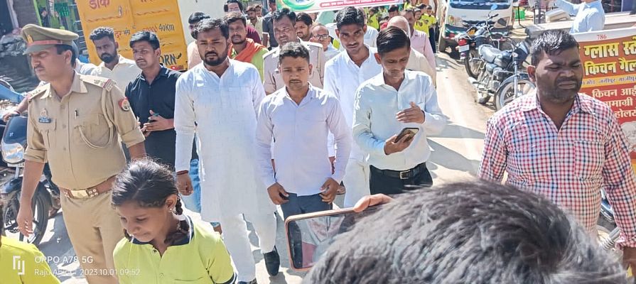 Teacher and students building community spirit